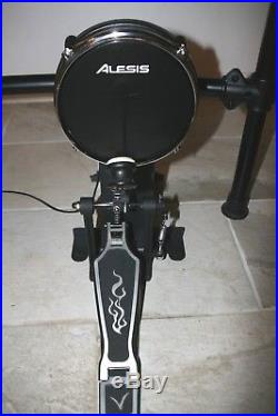 Alesis DM10 Studio Kit Six Piece Electronic Drum set with Real Head Drum Pads