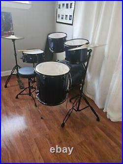 Ashthorpe full blue drum set, set up but never used before. Originally $370