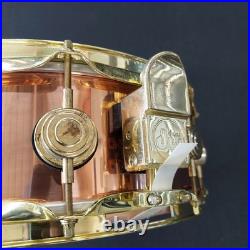 DW Collector's Series Copper 5x14 Snare Drum 2002 Polished Copper with Gold Lugs DW Collector's Series Copper 5x14 Snare Drum 2002 Polished Copper with Gold Lugs