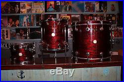 DW costom series 3 peice drumset in a red pearl wrap