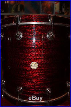 DW costom series 3 peice drumset in a red pearl wrap