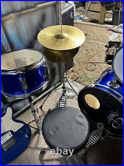 Drum set with electric guitar used