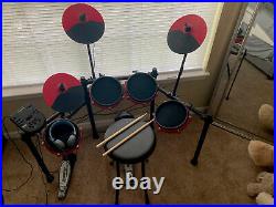 Electric drum set Alesis (Headphones, drum sticks and stool included)