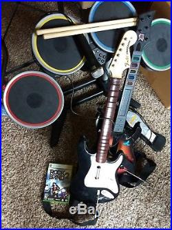 Rock Band Xbox 360 bundle 1 game, 2 guitars wireless, drum set, mic