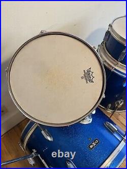 Vintage 1960's four pc PEARL drum set made for Dixie by PEARL Blue sparkle
