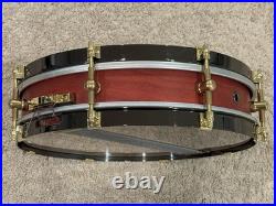 Weir 13x3 Cherry Piccolo Snare Drum With Black Hoops And Gold Hardware Drumset Weir 13x3 Cherry Piccolo Snare Drum With Black Hoops And Gold Hardware Drumset