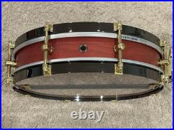 Weir 13x3 Cherry Piccolo Snare Drum With Black Hoops And Gold Hardware Drumset Weir 13x3 Cherry Piccolo Snare Drum With Black Hoops And Gold Hardware Drumset