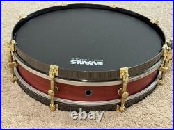 Weir 13x3 Cherry Piccolo Snare Drum With Black Hoops And Gold Hardware Drumset Weir 13x3 Cherry Piccolo Snare Drum With Black Hoops And Gold Hardware Drumset