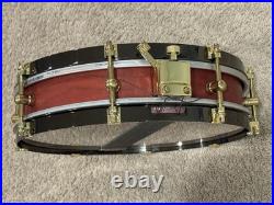 Weir 13x3 Cherry Piccolo Snare Drum With Black Hoops And Gold Hardware Drumset Weir 13x3 Cherry Piccolo Snare Drum With Black Hoops And Gold Hardware Drumset