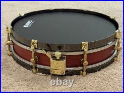 Weir 13x3 Cherry Piccolo Snare Drum With Black Hoops And Gold Hardware Drumset Weir 13x3 Cherry Piccolo Snare Drum With Black Hoops And Gold Hardware Drumset